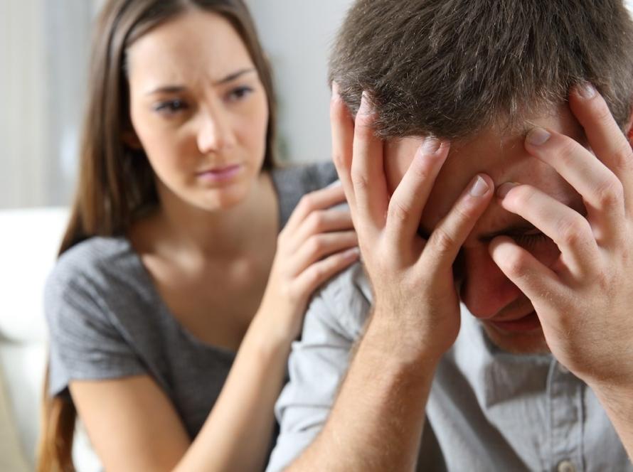 Couple with man in panic attack